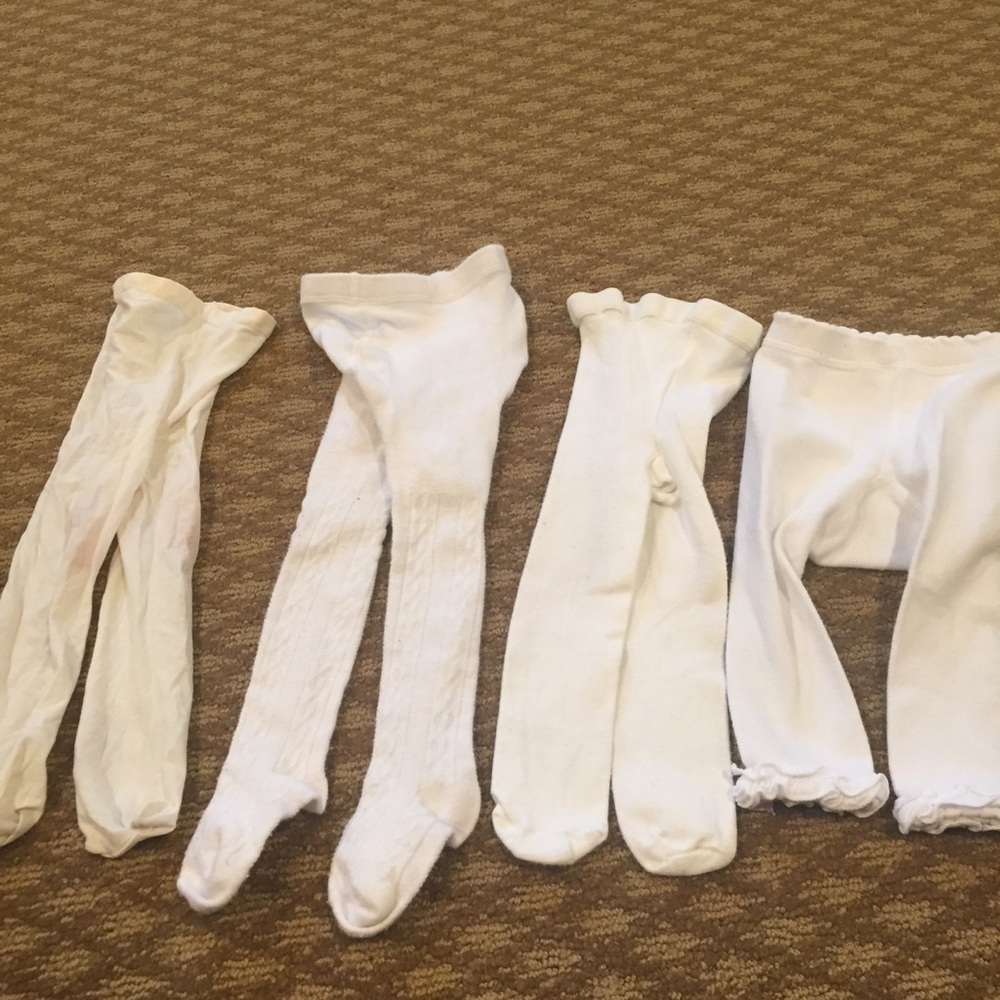 Set of white tights 6-18 months good condition